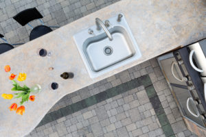 Exotic Concrete Counter Top In An Outdoor Kitchen